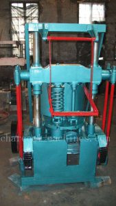 Coal and charcoal extruder machine
