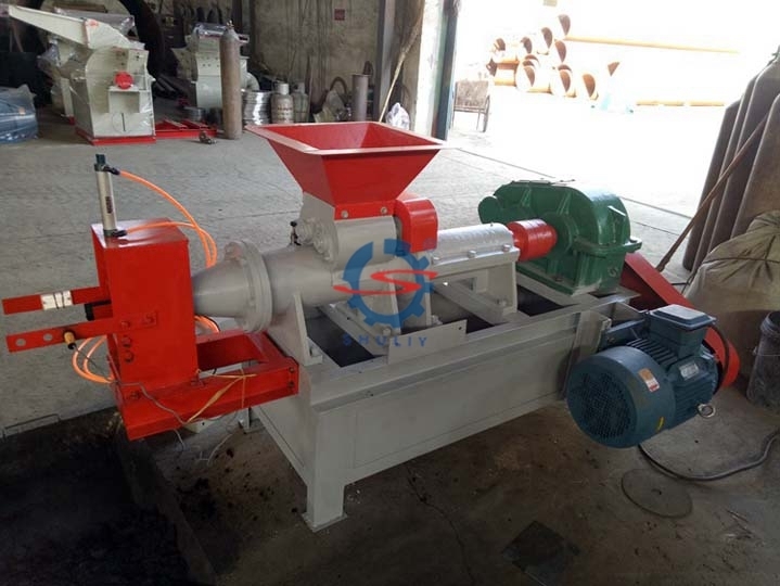 Charcoal briquette machine